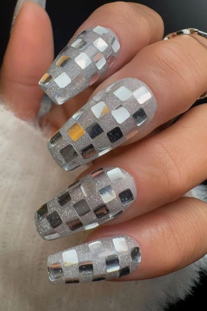 Full mirror disco nails with dazzling chrome finishes.