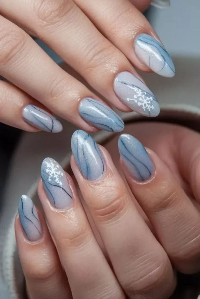 Glittering snowboard trail inspired nails.