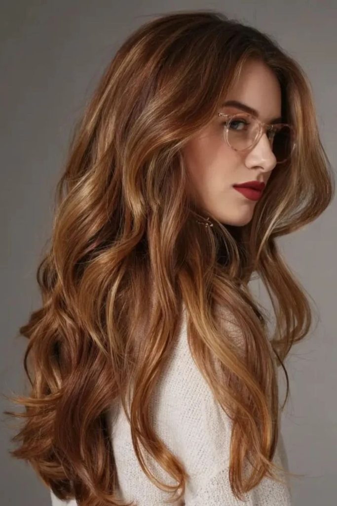 Golden gingerbread brunette with luminous highlights.
