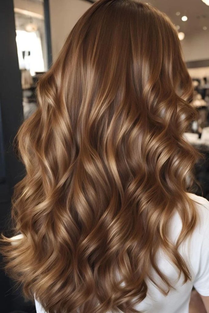Golden hazelnut hair with honey highlights.