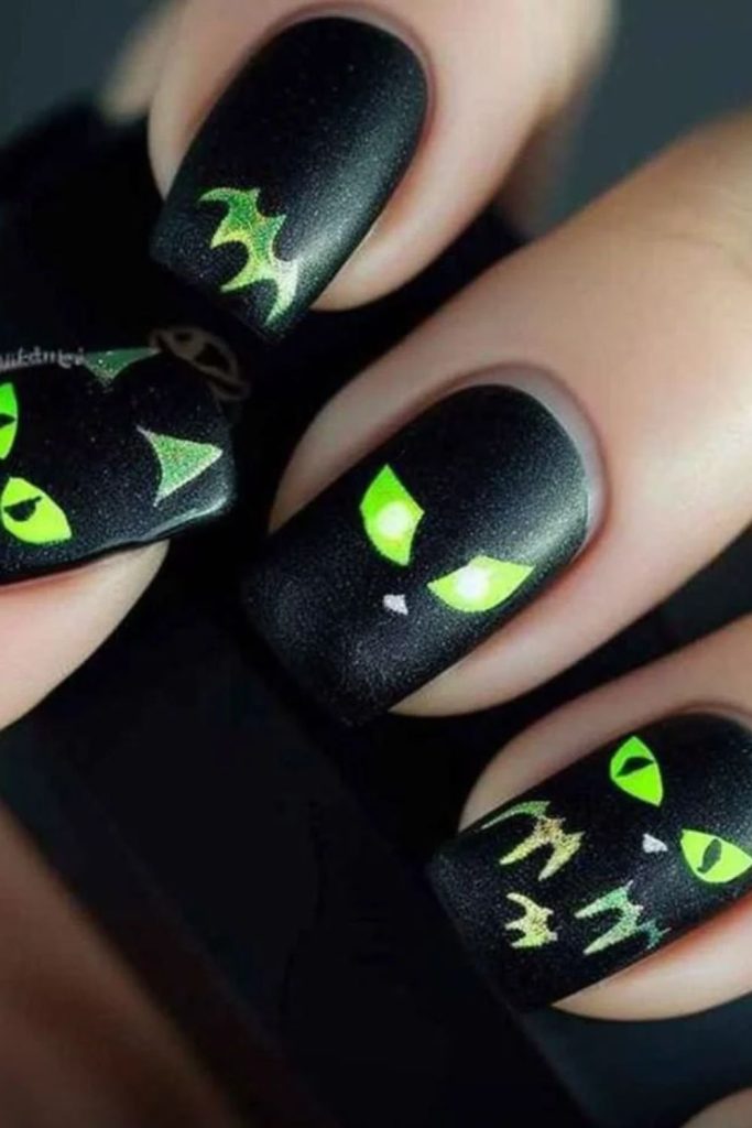 Haunted black cat Halloween nails