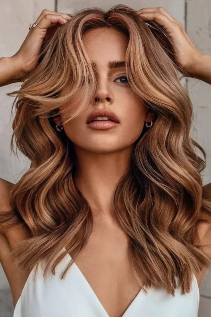 Hazelnut cinnamon brown hair with warm reflections.