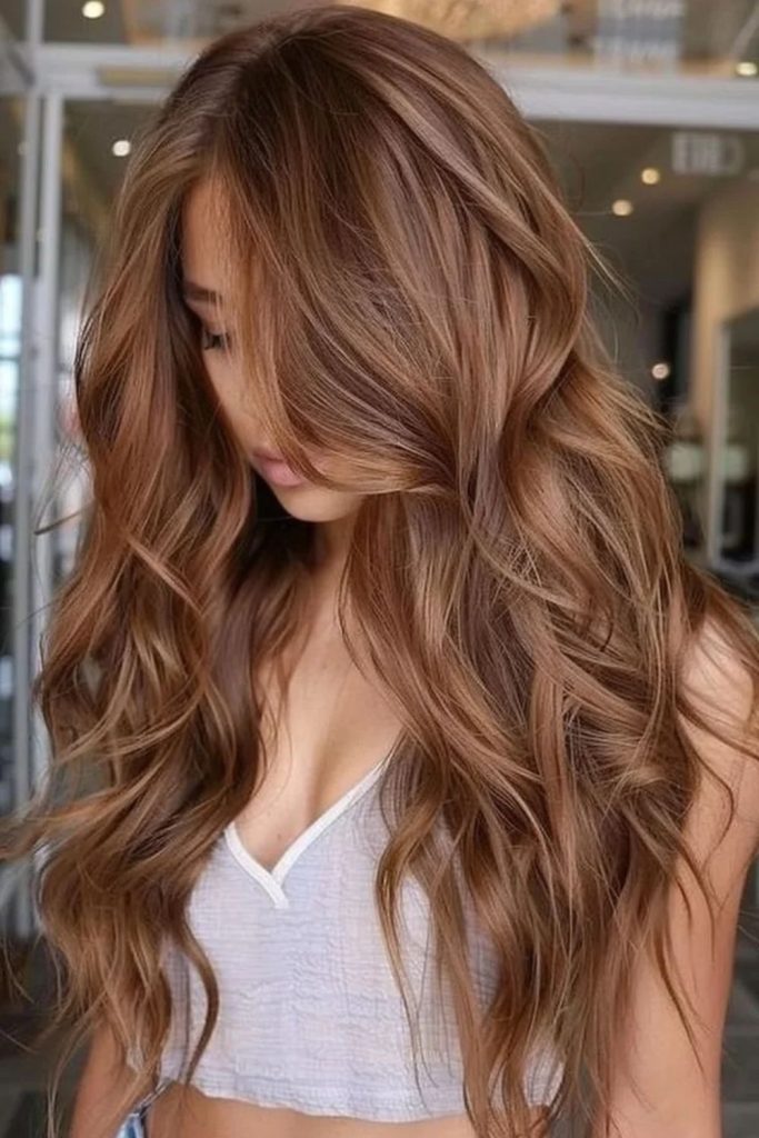 Hazelnut honey highlights on brunette hair.