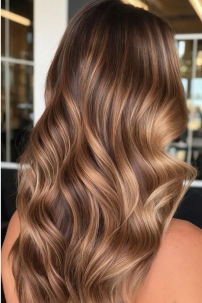 Cocoa brown hair with sandy balayage.