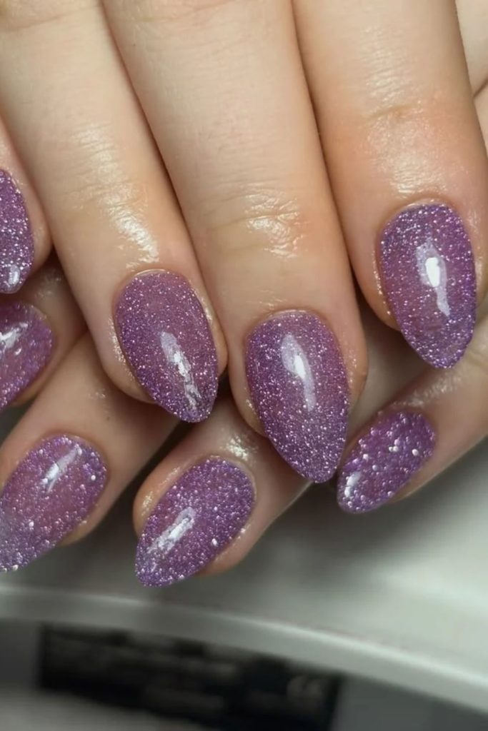 Lavender disco nails with delicate silver sparkle.