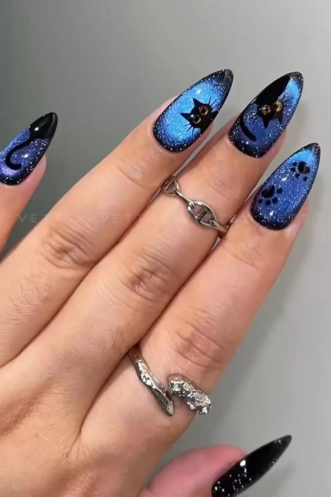 Midnight black cat eye nail art