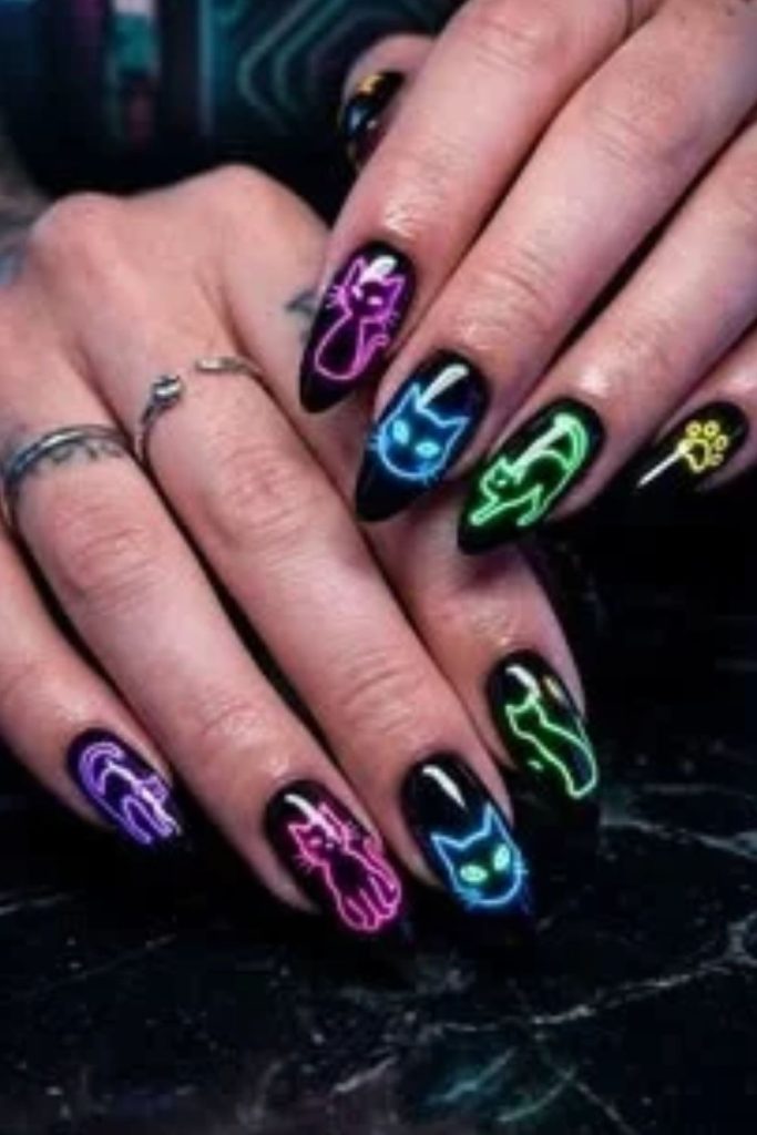 Neon black alley cat nails