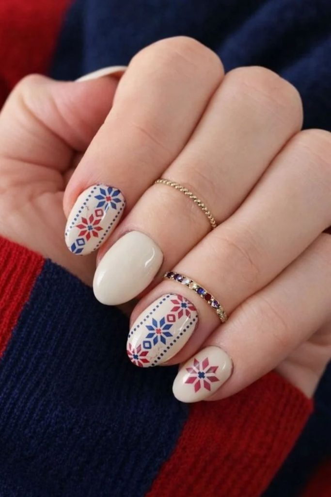 Nordic striped sweater ski nails.
