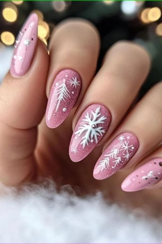 Soft pink nails with romantic poinsettia blossoms.