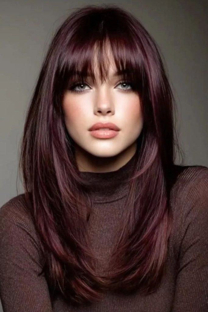 Plum mulled wine layered hair.