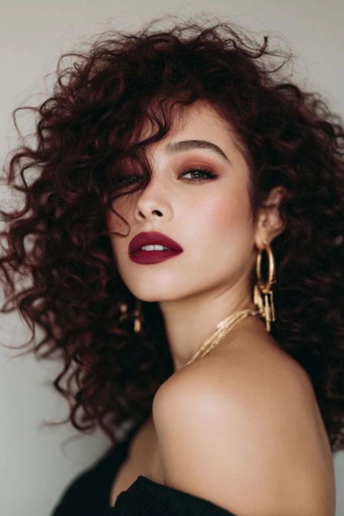 Romantic cherry cola makeup with rosy tones.