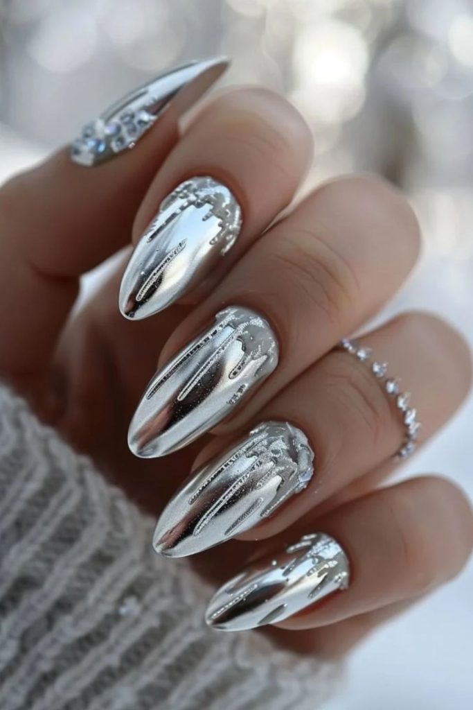 Glamorous silver ski queen nails.
