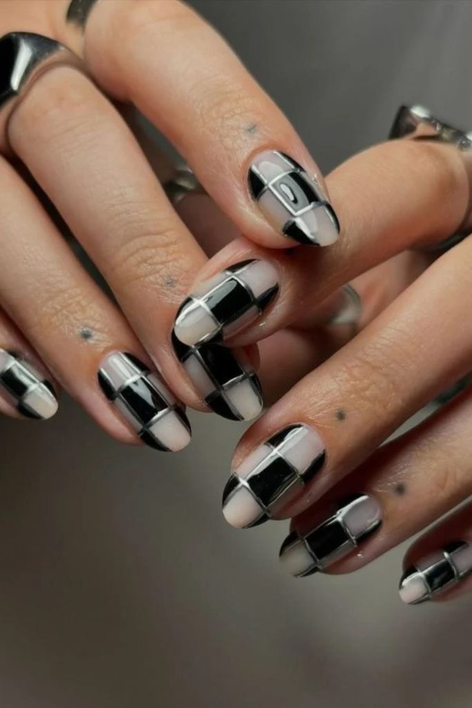 Checkerboard Skeleton Nails with Bold Geometric Patterns