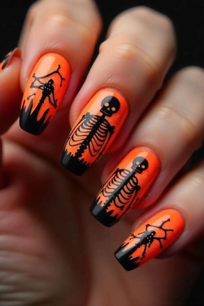 Orange Skeleton Nails with Festive Halloween Accents