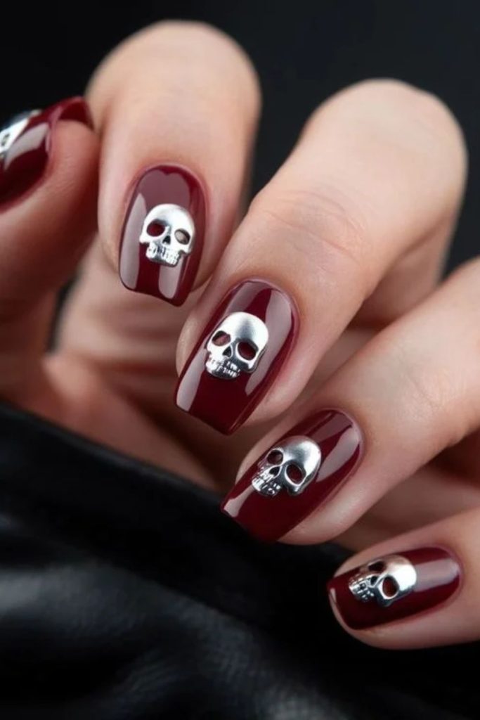 Red Chrome Skeleton Nails with Reflective Crimson Finishes